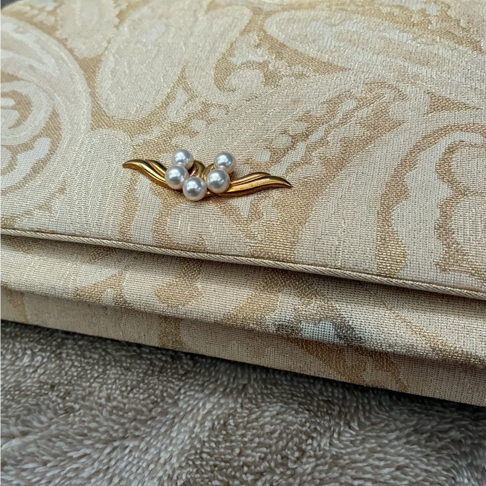 Mikimoto Cream Clutch with Gold Accents